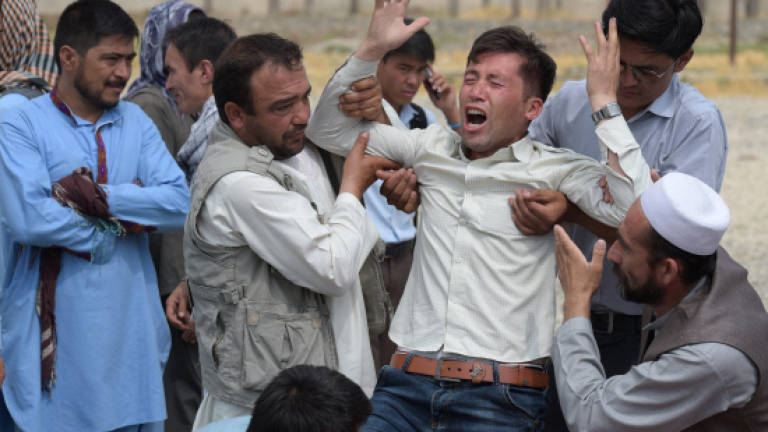 Kabul in mourning after deadliest attack in 15 years