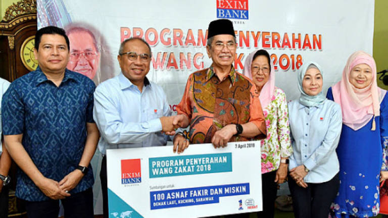 Exim Bank disburses RM100k for tithe recipients in Kuching