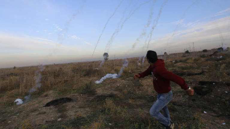 Israeli tank, aircraft hit Gaza after rocket fire