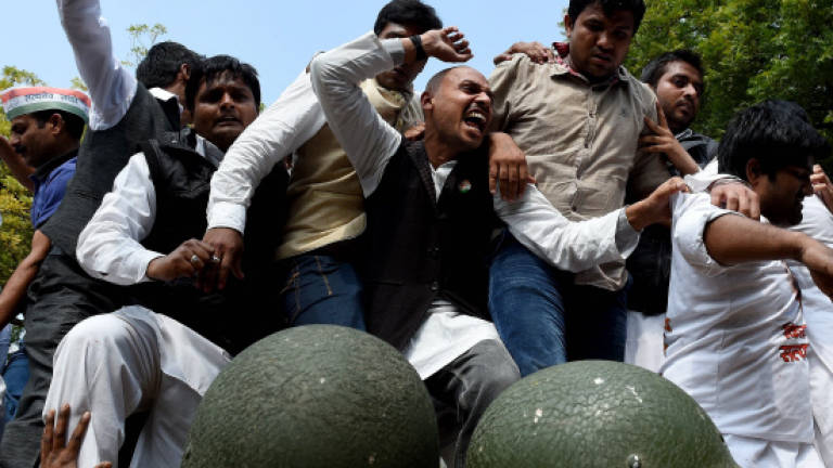 Police clash with protesters in Indian capital over land reform