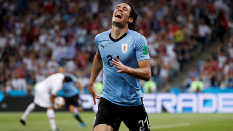 Uruguay's Cavani unlikely to face France in quarter-final
