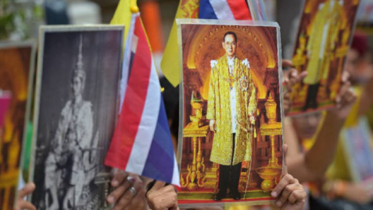 Thai activist's mother arrested for not condemning royal insult