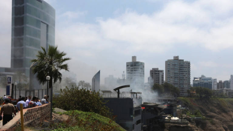 Five die in Lima fire near hotel for Apec attendees
