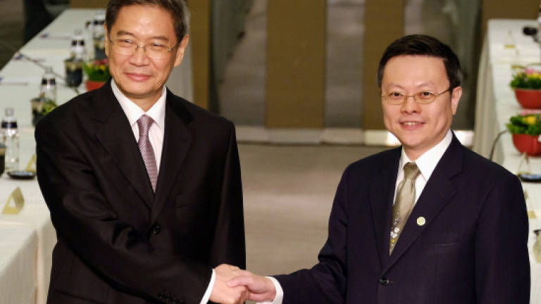 China sends minister to Taiwan for first time