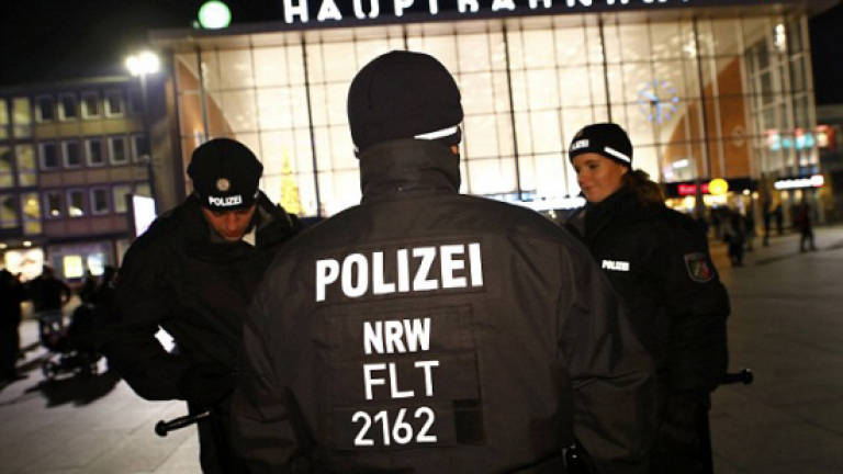 Heavy police watch keeps Cologne calm on New Year's Eve