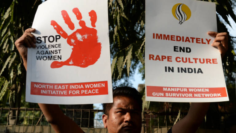 India police arrest one for killing baby, raping mother