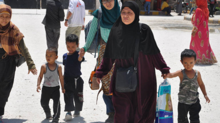 Indonesians decry IS 'lies' after fleeing Syria's Raqa