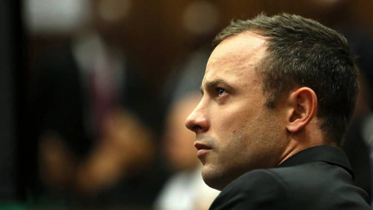 Pistorius fired gun in eatery, tried to shift blame: friend