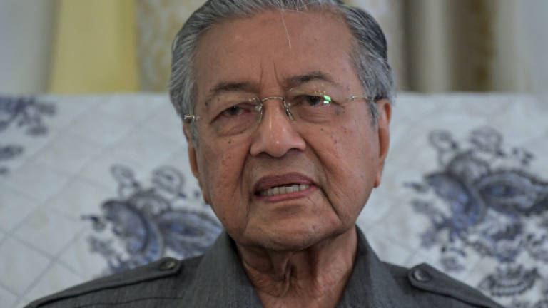 Dr M: Certain individuals, businessmen forced to pay extra tax under previous govt