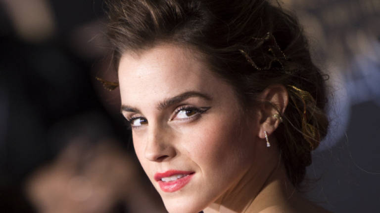 Actress Emma Watson takes feminist book happening to Paris