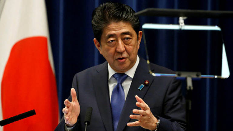 Japan's Abe triggers snap election amid N.Korea crisis