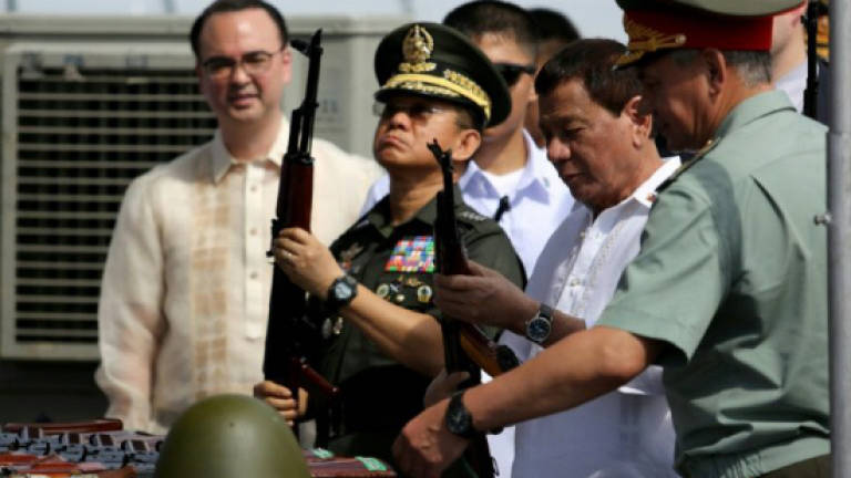 Philippines' Duterte receives Russian assault rifles