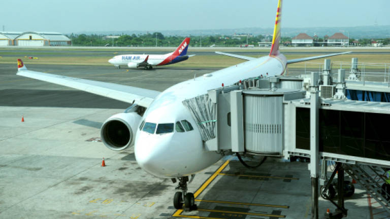Twelve injured as Hong Kong Airlines flight hits turbulence