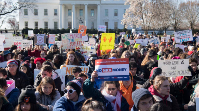 'Never again!': US students stage walkout against gun violence