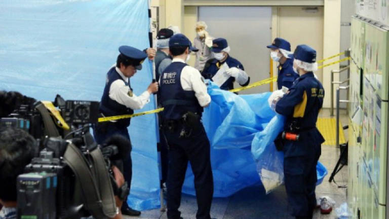 Two bodies found in suitcases in Japan woods: media