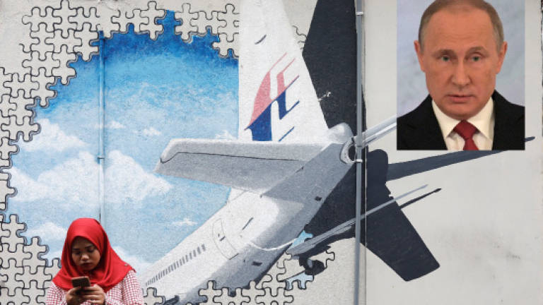 Putin knows where MH370 crashed, says investigator