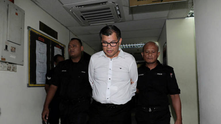 MBI founder charged with financial crimes, faces RM5m fine