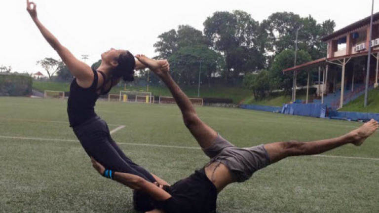 Yoga in acrobatic motion