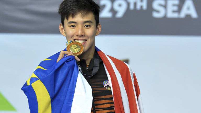 Welson Sim's suicidal dash in last 25m rewarded with gold, games record