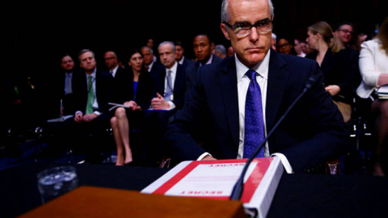 Acting FBI chief: Comey firing won't stop Russia probe