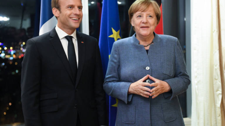 Merkel backs Macron grand plan at EU dinner