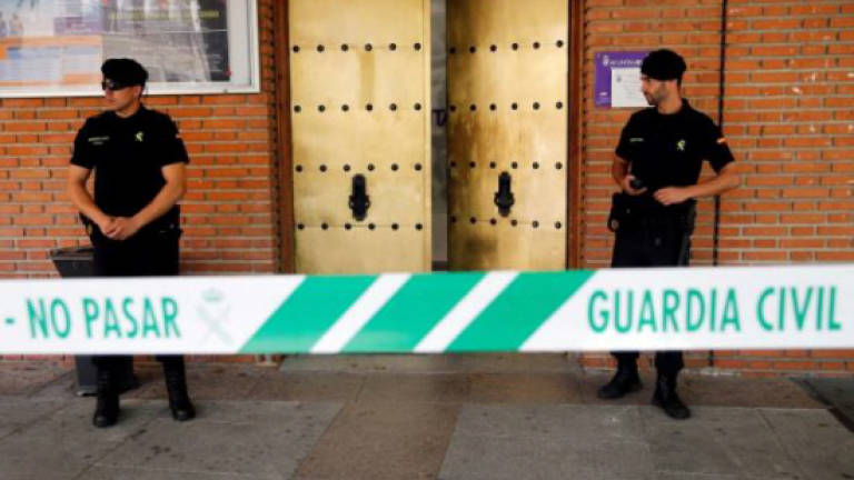 Spanish police target 50 town halls in anti-graft probe