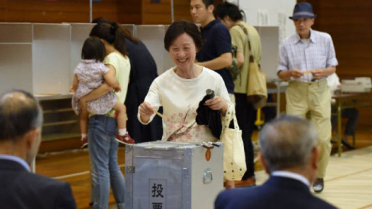 Japan PM Abe stung by huge loss in Tokyo assembly vote