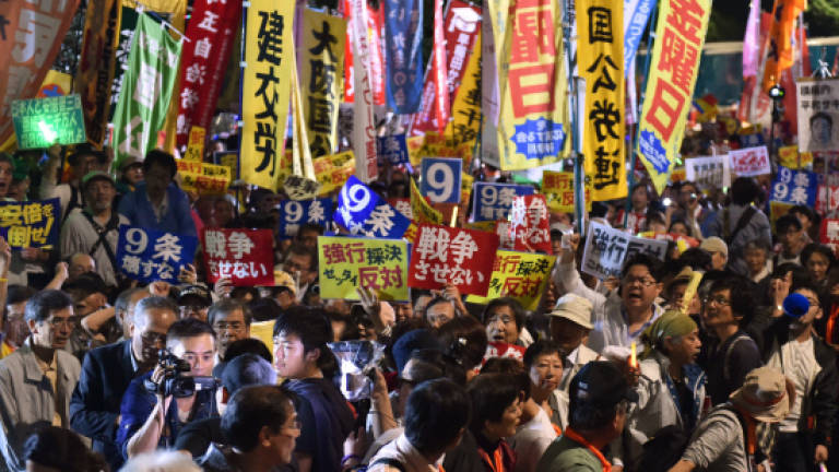 Japan set to pass security bills despite widespread anger