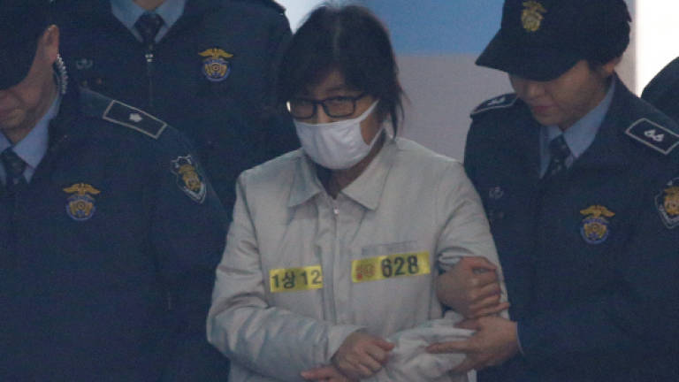 'Rasputin' at heart of S. Korea crisis appears in court