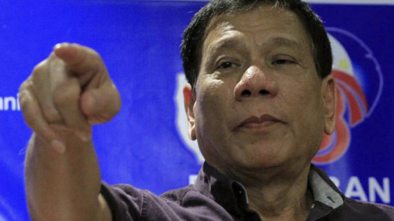 Confusion after Philippines' Duterte threatens martial law