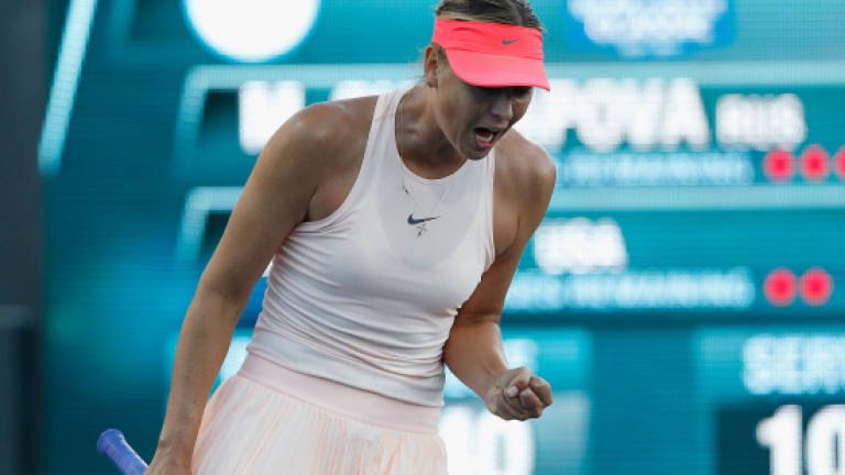 Sharapova battles into second round at Stanford