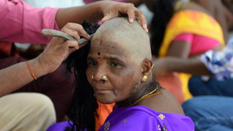Hair for the Gods ends up on thinning heads in Europe, Africa