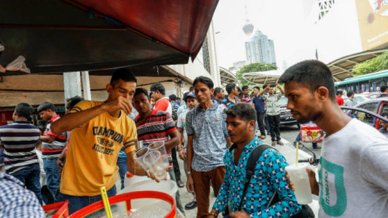 Foreign workers 'flood' the city on second day of Aidilfitri