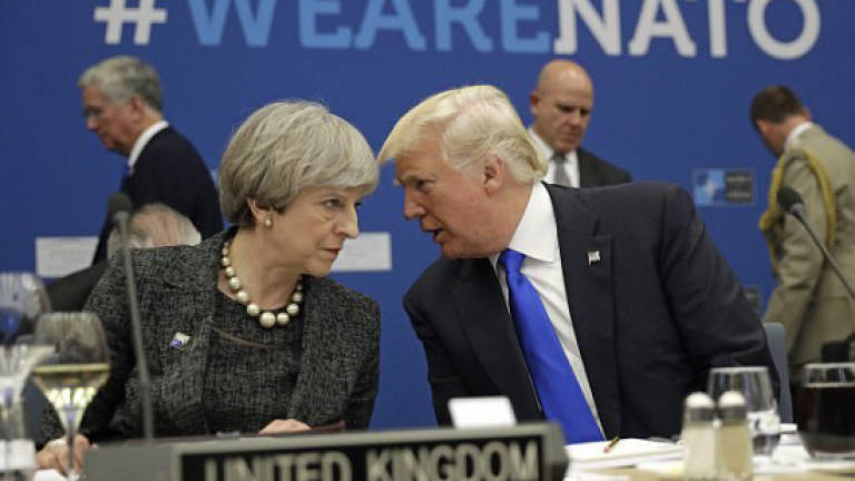 Trump to meet British PM May in Davos next week