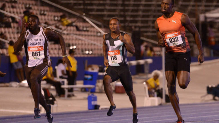 Bolt breezes into semis at Jamaican Trials
