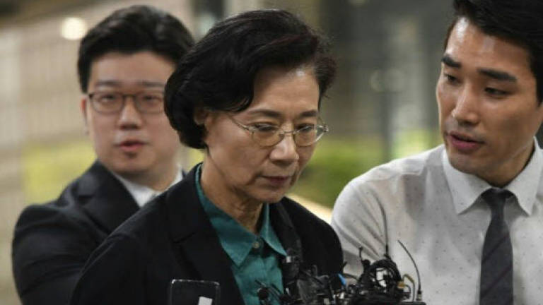 Mother of 'nut rage' Korean Air heiress grilled over illegal maids