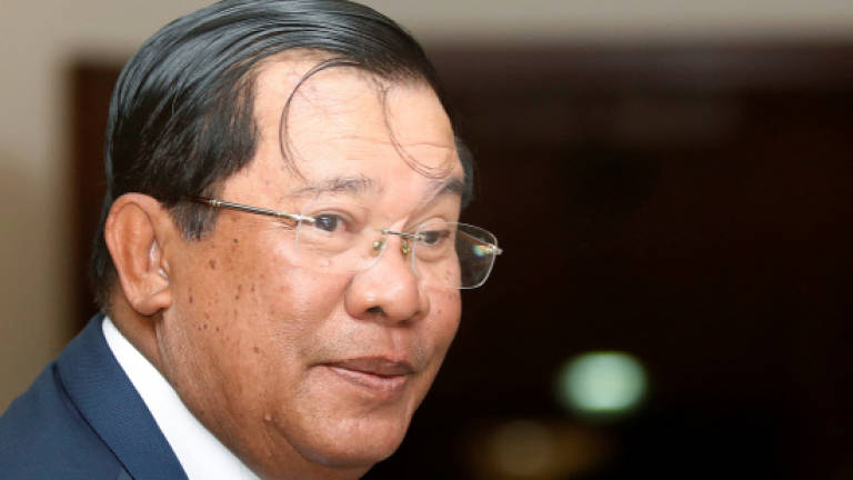 MPs back change that bars Hun Sen's rival