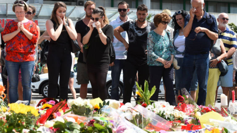 Munich gunman planned shooting for a year, chose victims randomly