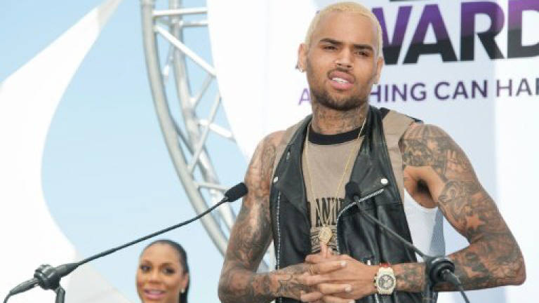 Singer Chris Brown arrested on weapons charge