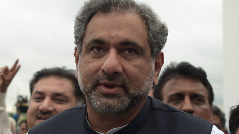 Pakistan's parliament elects ex-oil minister Abbasi as new PM