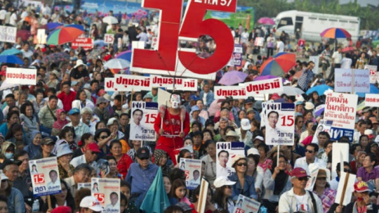 Ousted party urges Thais to reject junta's constitution