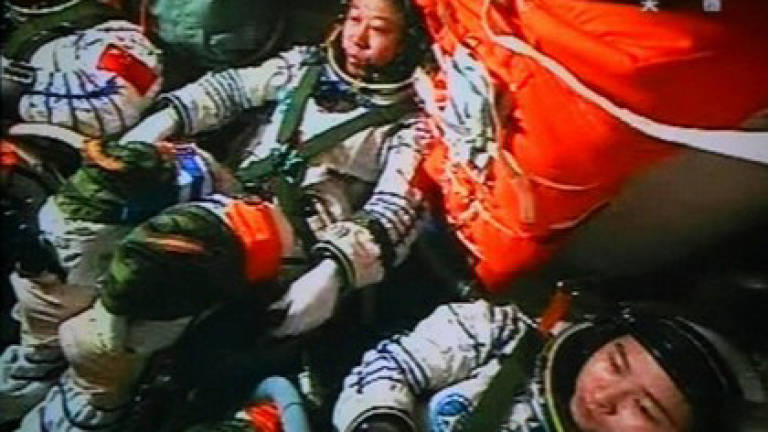 Chinese astronauts return to earth after longest mission