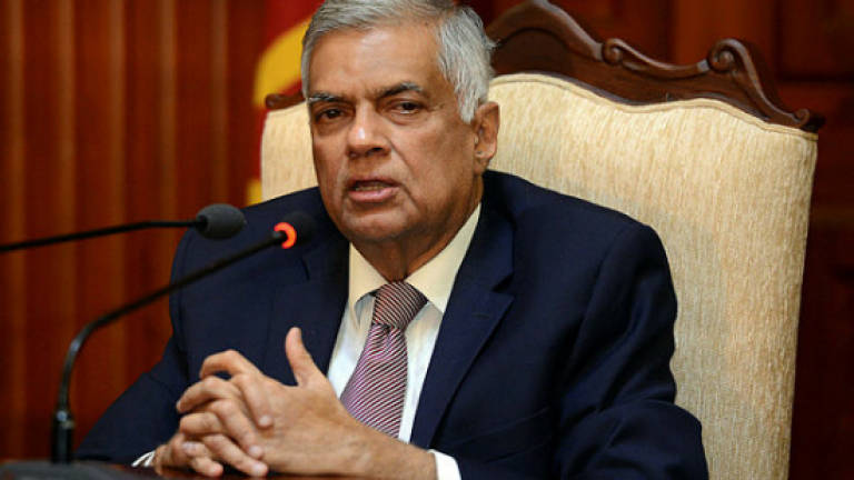 Sri Lanka PM takes over law and order after vote defeat