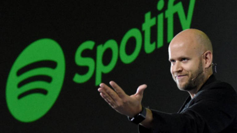 Spotify aims to strike chord in stock market debut
