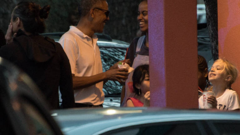 Obamas play Christmas Eve escape game; Trumps attend late night mass