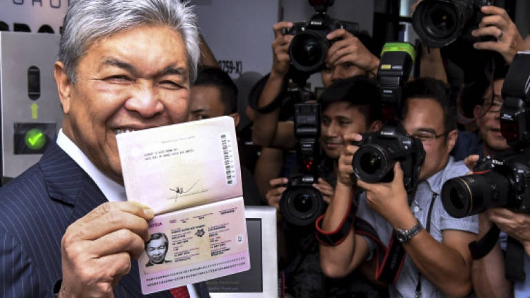 Complete switch to new passport booklet in Feb: DPM