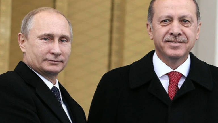 Putin and Erdogan hold first phone talk since jet downing