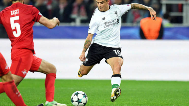 Coutinho scores as Liverpool held in Moscow