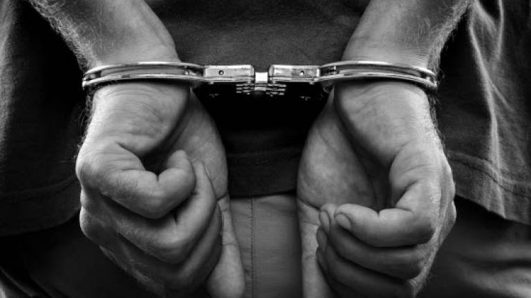 Policeman arrested to assist probe into gang robbery, extortion