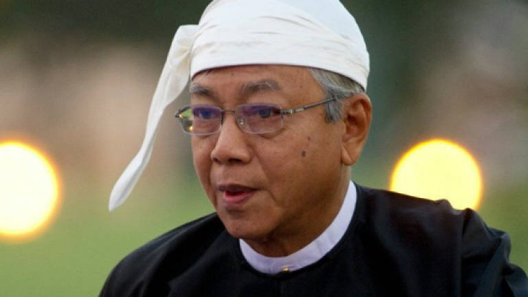 Myanmar president pardons 83 prisoners